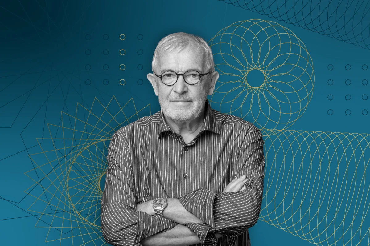 Retrato de Francis Halzen sobre un fondo azul con motivos geométricos